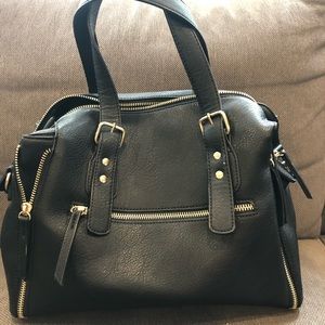 Black Jessica handbag with gold colour zippers